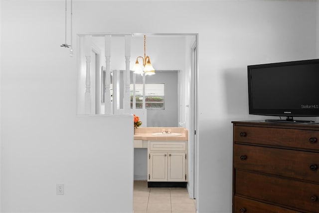 bathroom with tile patterned floors and vanity