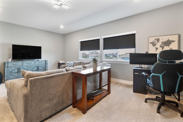 living area with carpet floors, baseboards, and recessed lighting