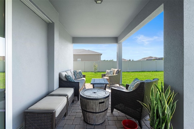 view of patio with outdoor lounge area and a fenced backyard