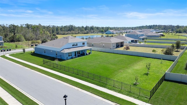 birds eye view of property featuring a water view and a rural view