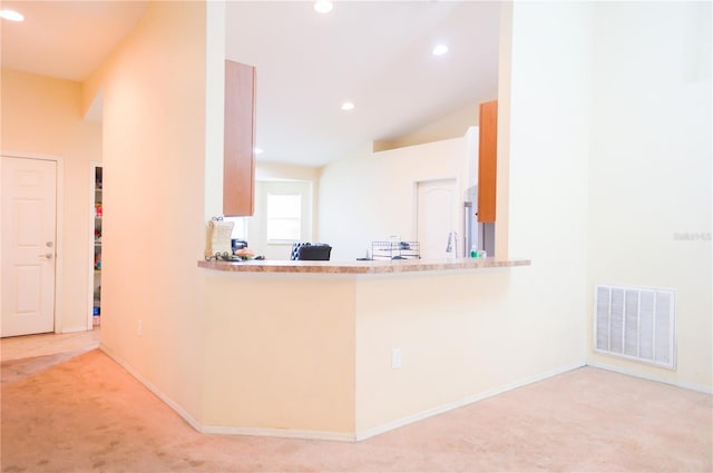 kitchen featuring baseboards, carpet floors, visible vents, and recessed lighting