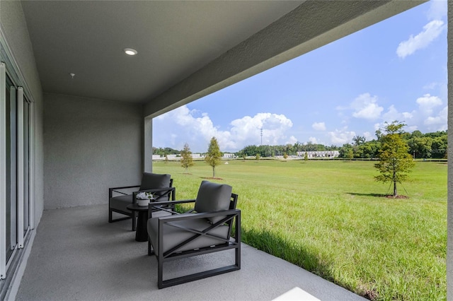 view of patio with a rural view