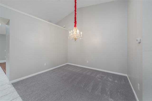 unfurnished room featuring an inviting chandelier, carpet, baseboards, and vaulted ceiling