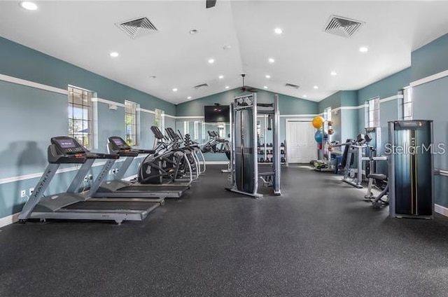 workout area with recessed lighting, visible vents, vaulted ceiling, and baseboards