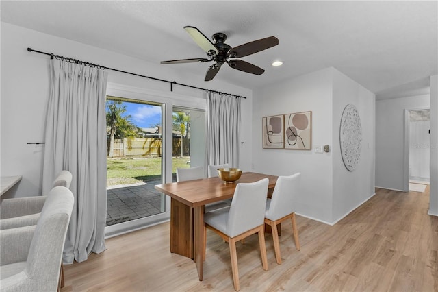 dining area with light wood-type flooring, ceiling fan, and recessed lighting