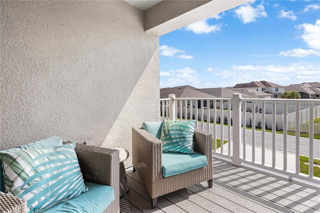 balcony featuring a residential view