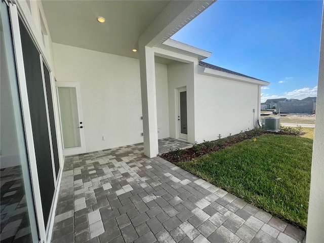 view of patio with central AC