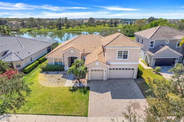 bird's eye view with a water view