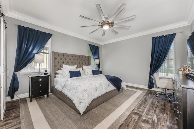 bedroom featuring ornamental molding, a ceiling fan, baseboards, and wood finished floors