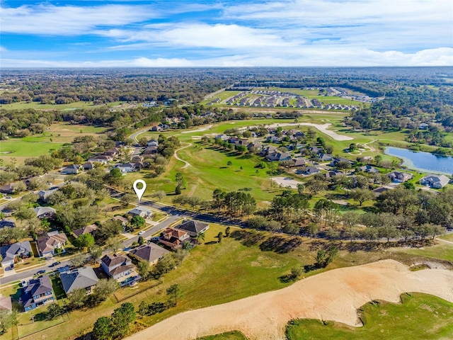 birds eye view of property featuring a water view and a residential view