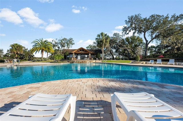 pool featuring a patio area