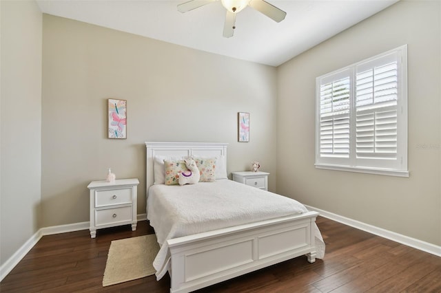 bedroom featuring dark wood-style floors, ceiling fan, and baseboards