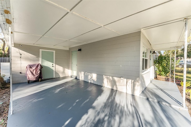 view of patio / terrace with an attached carport