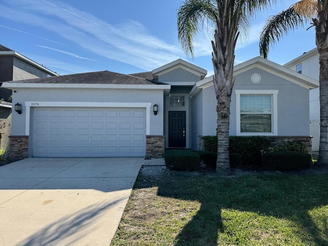 ranch-style house with stucco siding, stone siding, driveway, and an attached garage