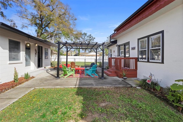 view of yard featuring an outdoor fire pit, a patio area, fence, and a pergola