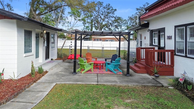 view of yard featuring a patio, fence, and a pergola