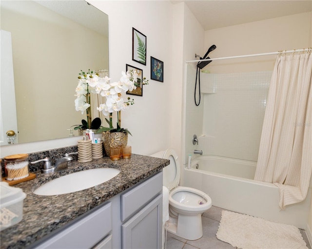 full bathroom with shower / tub combo, vanity, toilet, and tile patterned floors