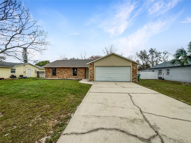 ranch-style house featuring brick siding, concrete driveway, fence, a garage, and a front lawn