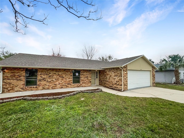 single story home featuring brick siding, roof with shingles, concrete driveway, a garage, and a front lawn