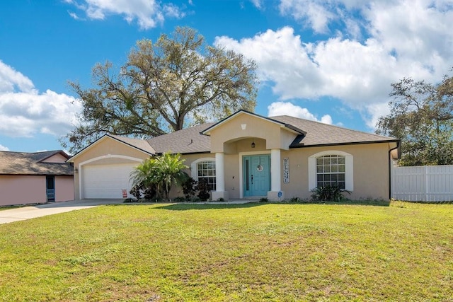 single story home with a garage, fence, a front lawn, and stucco siding