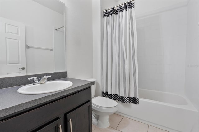 full bathroom featuring toilet, tile patterned flooring, shower / tub combo with curtain, and vanity