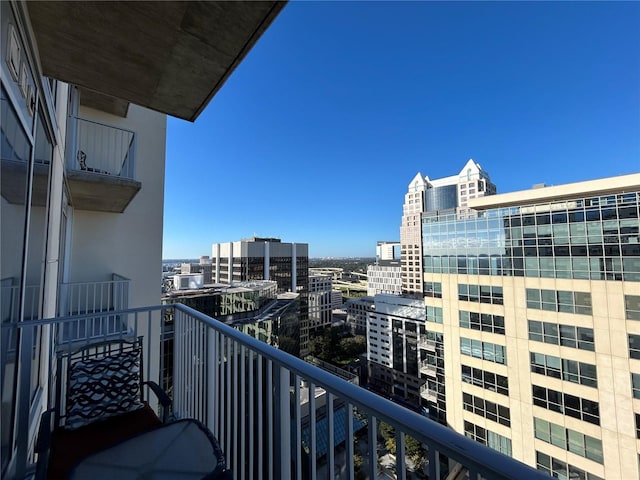 balcony featuring a city view