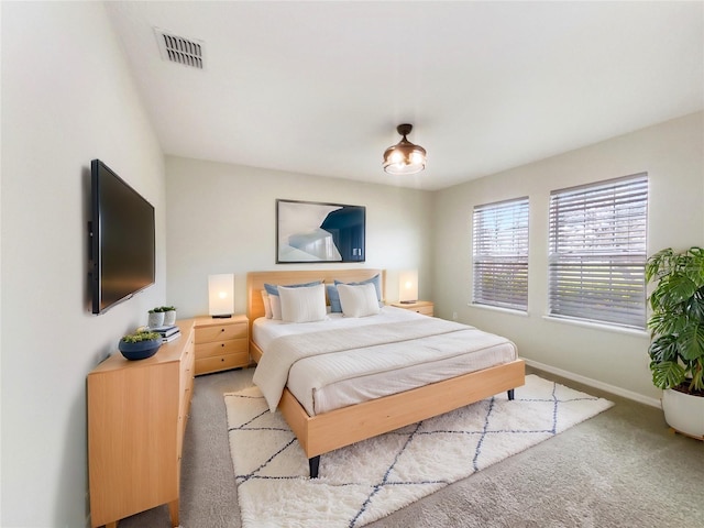 15120 Zenith Ave, Mascotte, FL 34753 - bedroom with visible vents, light carpet, and baseboards