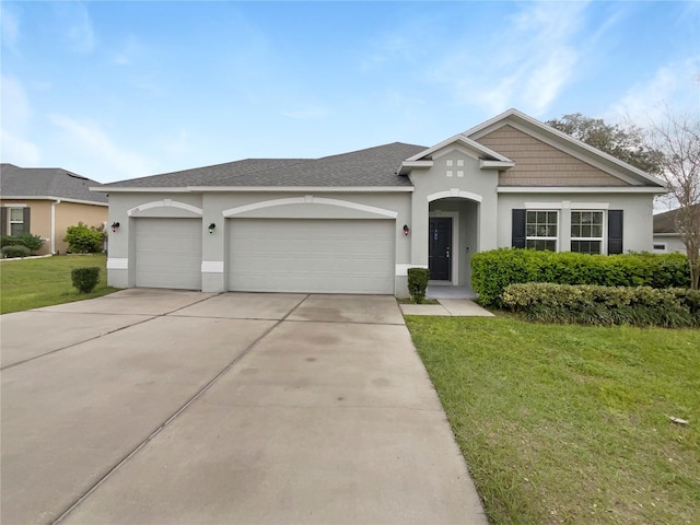15120 Zenith Ave, Mascotte, FL 34753 - single story home featuring a garage, driveway, a front lawn, and stucco siding