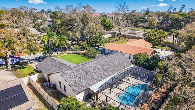 birds eye view of property with a residential view