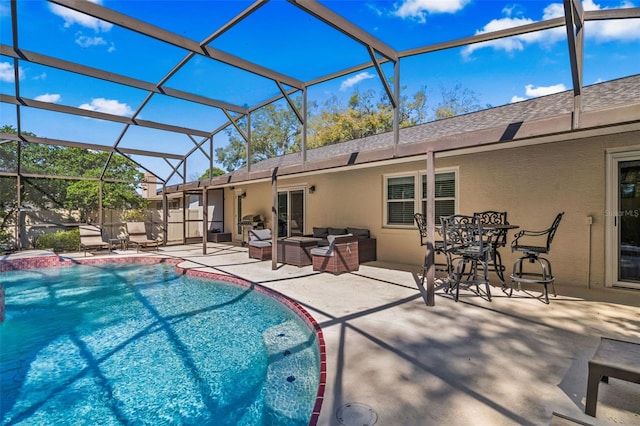 view of swimming pool featuring glass enclosure, an outdoor hangout area, a fenced in pool, and a patio