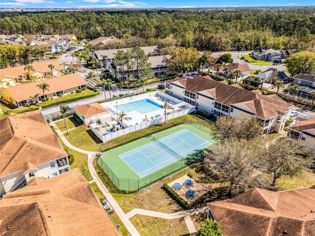 bird's eye view featuring a residential view and a forest view