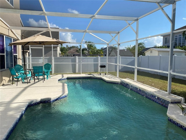 view of pool featuring a lanai, a fenced backyard, a fenced in pool, and a patio