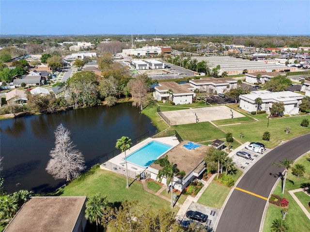 birds eye view of property featuring a residential view and a water view