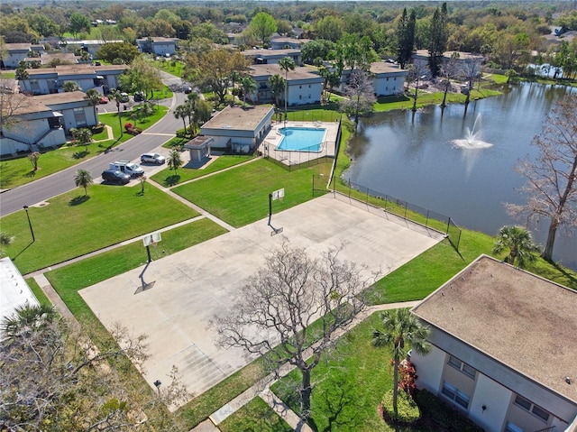 aerial view featuring a residential view and a water view