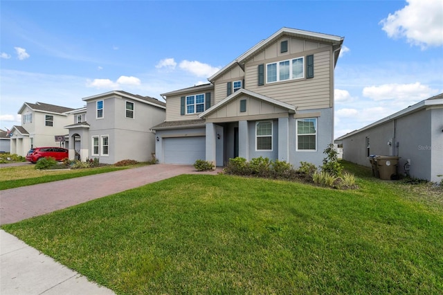 view of front facade with a garage, decorative driveway, board and batten siding, and a front lawn