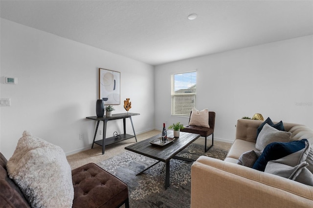 living room with carpet floors and baseboards