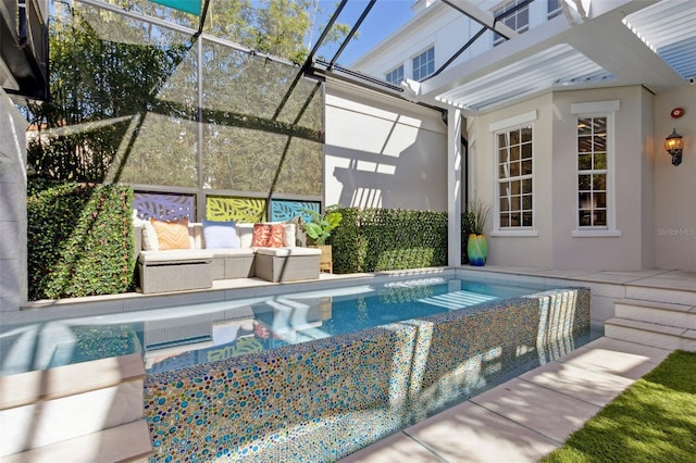 pool featuring glass enclosure, a patio, and outdoor lounge area