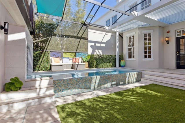 view of swimming pool with a lanai, a patio area, and an infinity pool