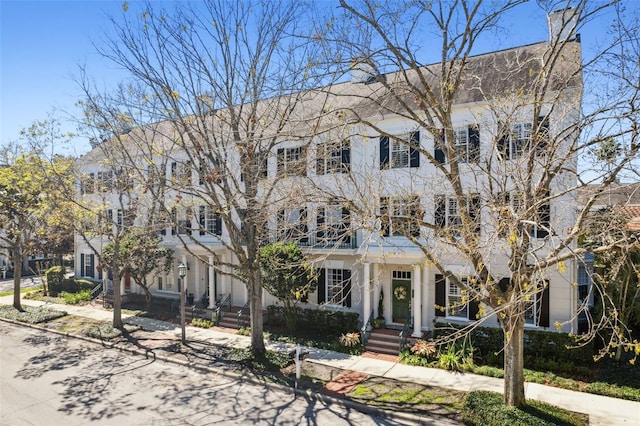 colonial house with a balcony