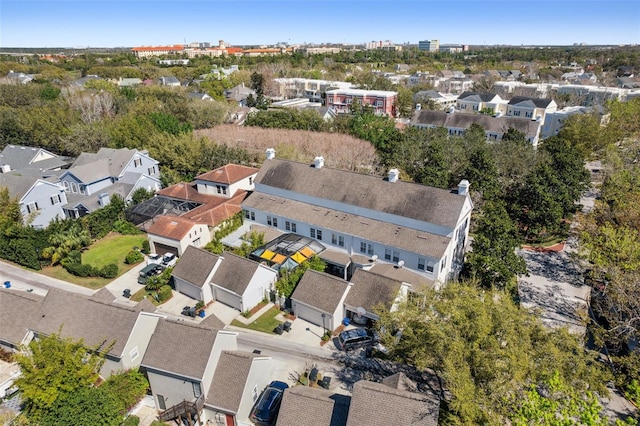 birds eye view of property with a residential view