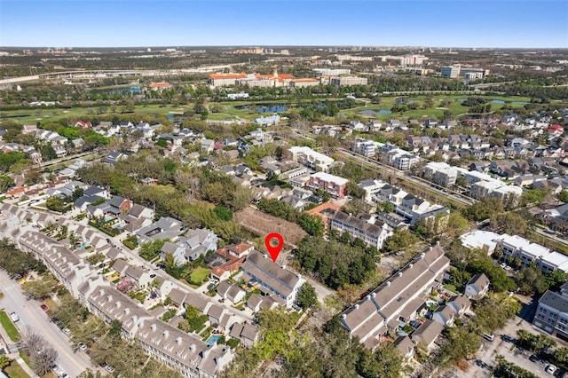 bird's eye view with a residential view and a water view