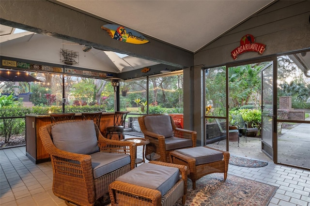 sunroom / solarium with lofted ceiling