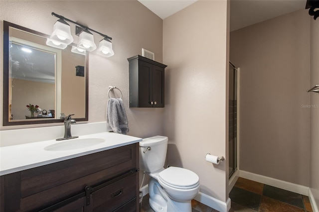 bathroom featuring a stall shower, baseboards, visible vents, toilet, and vanity