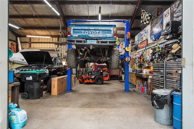 garage with a workshop area