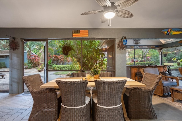 dining room featuring a healthy amount of sunlight and ceiling fan