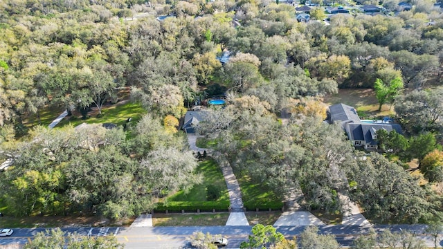 bird's eye view featuring a view of trees