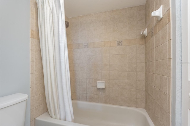 full bath with shower / bath combo and toilet