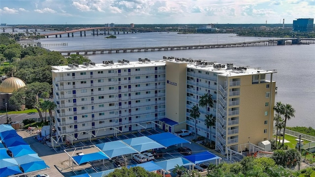 bird's eye view featuring a view of city and a water view