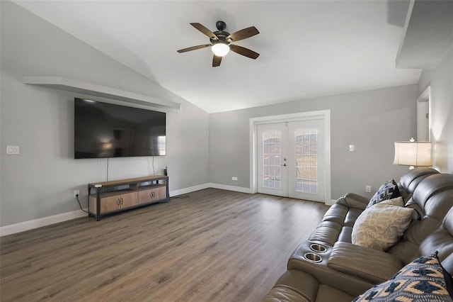 living area featuring lofted ceiling, french doors, wood finished floors, and baseboards