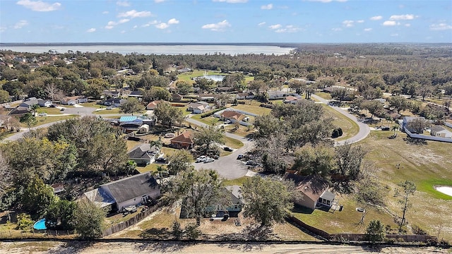 bird's eye view with a residential view and a water view